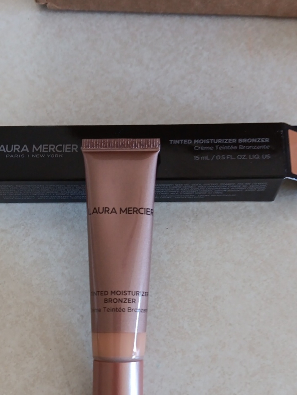 laura mercier Tinted Moisturizer Bronzer Sundrop 02.